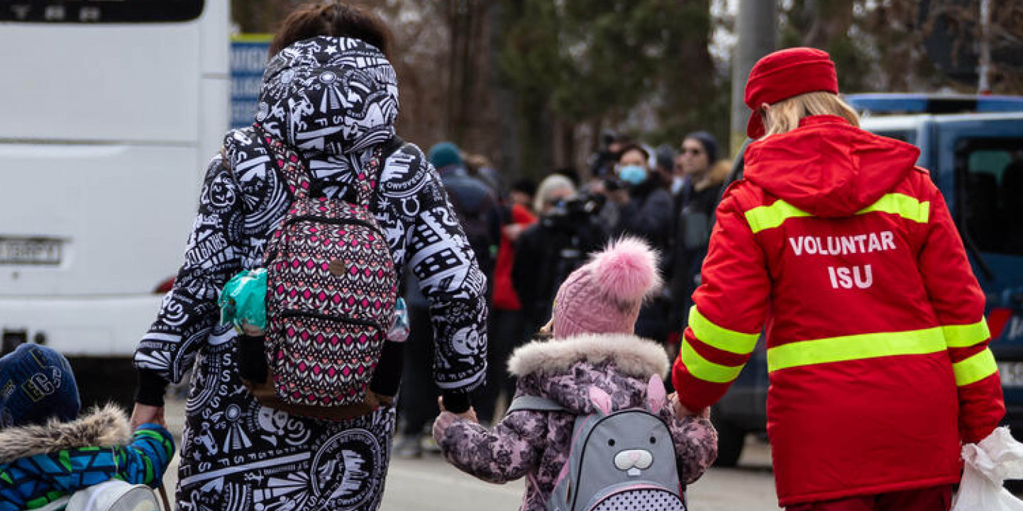 children crossing border in Romania