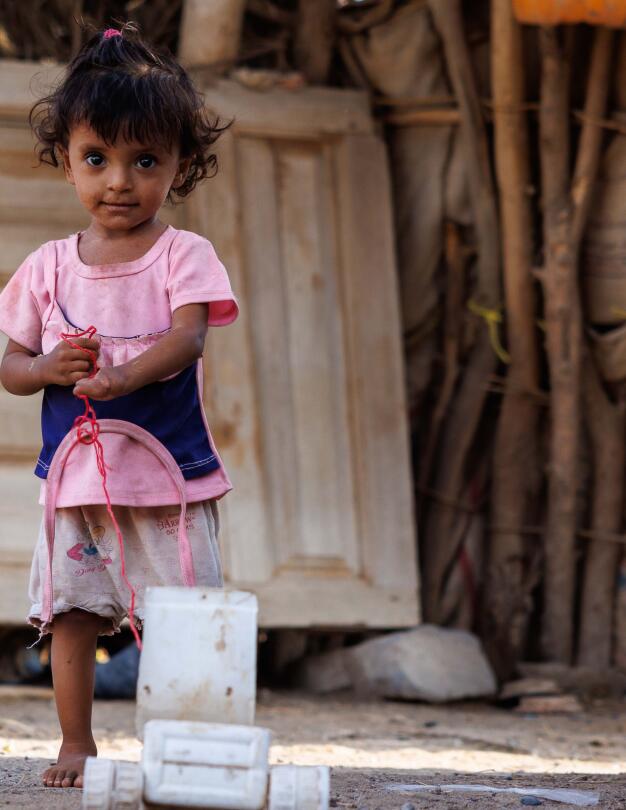 CH11436453 Manal, 2, playing at her home, where she lost part of her hand due to Unexploded Ordnance in May 2025