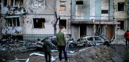 CH1662363 20032022   Residents looking at the damage caused by shelling that destroyed their apartment in Kyiv Ukraine