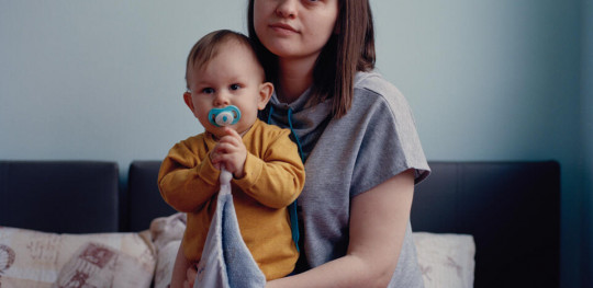CH1671170 A portrait of Milena 22 Bohdan 1 years old both are from Ukraine at the school that has been turned into dorms for Ukrainian refugees