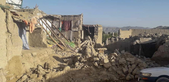 CH1694490 Nazirs home which collapsed when a 59 M earthquake struck his village in Paktika province Afghanistan