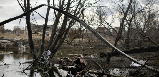 CH1714593 Abandoned baby strollers under a bombed bridge in Irpin Ukraine