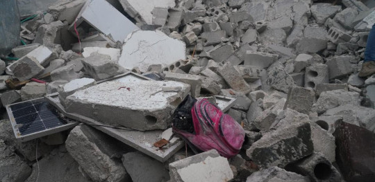 CH1769933 A childs school bag sits in the rubble after the earthquake in Afrin District Aleppo Governorate Northwest Syria