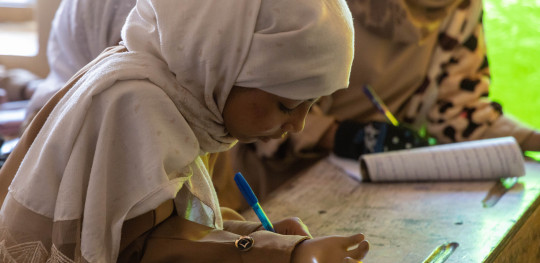 CH1784643 Maha 10 pictured at school with her prosthetic hand after being severely injured by a landmine while collecting firewood with her 16 year old sister Maya in Taiz Yemen