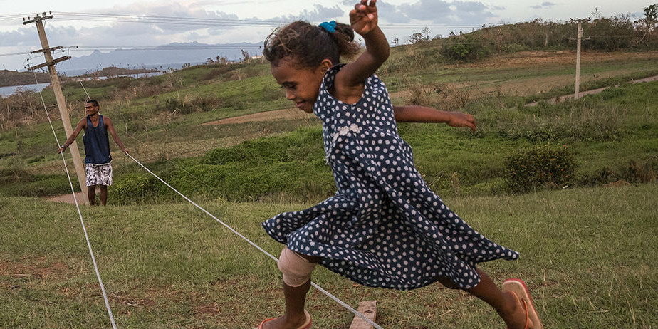 girl jumping powerlines