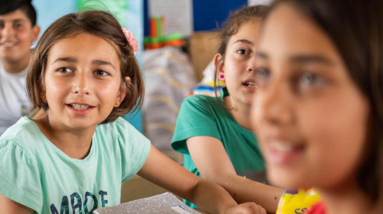 children learning in Save the Children classroom