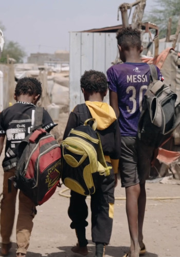 CH11000537 Kids walking in camp in Lahj Yemen v2