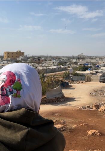 CH11554746 Lina looks out at the camp she has lived in for the past 5 years