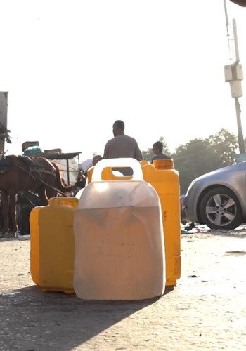 CH1923572 jerry cans filled with water on the street v2