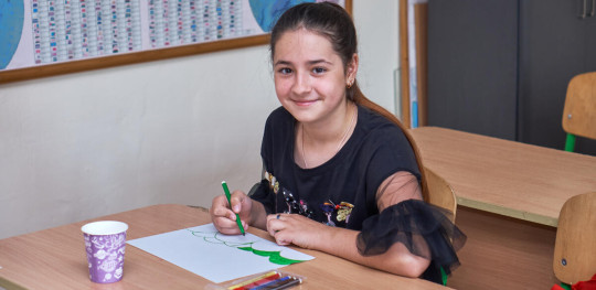 CH1838111 Zoriana 12 is drawing her home in Kramatorsk at her school in a village in western Ukraine