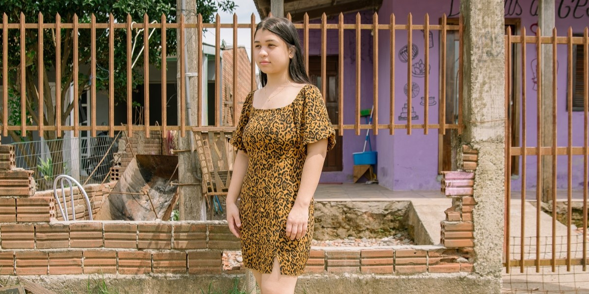 CH11265999 Denise in front of the house she lost to flooding in Brazil (1)
