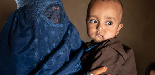 Afghan. 1 year on Abdul Karim with his mum Leila